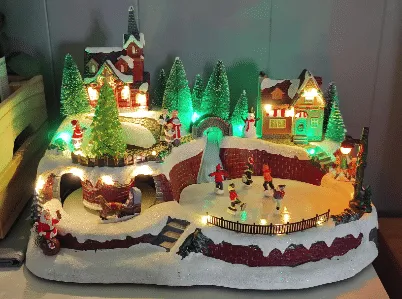 Animated Christmas Snowy Village Moving Skaters Sleigh LED Lights Music